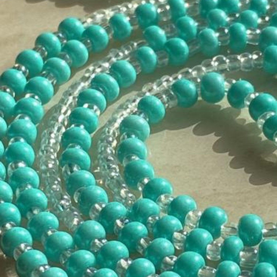 aqua and clear glow in the dark waist beads